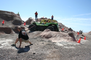 Jeremy giving it all that he's got to get my big, fat Jeep up and over the rock